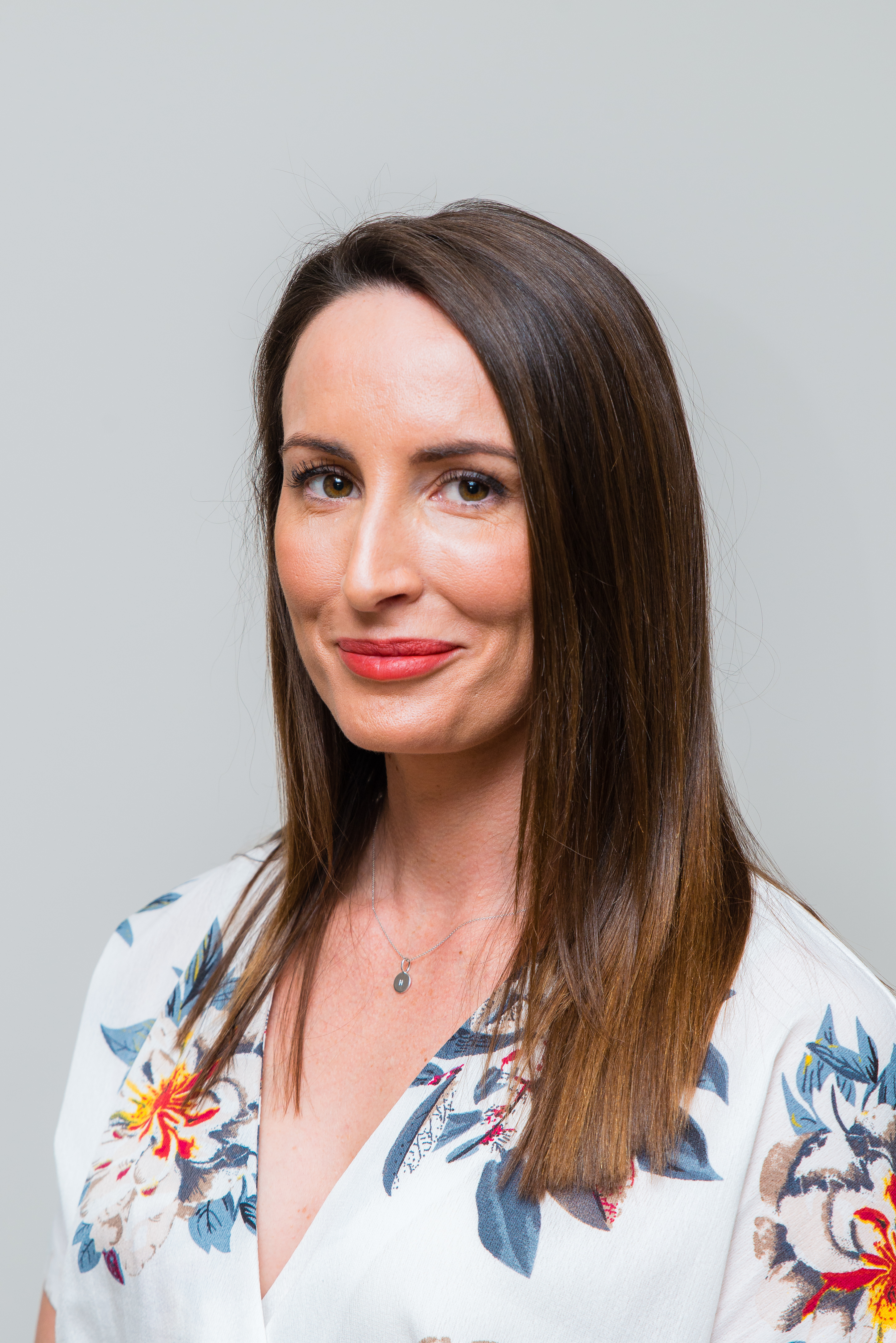 Woman in business attire, professional headshot